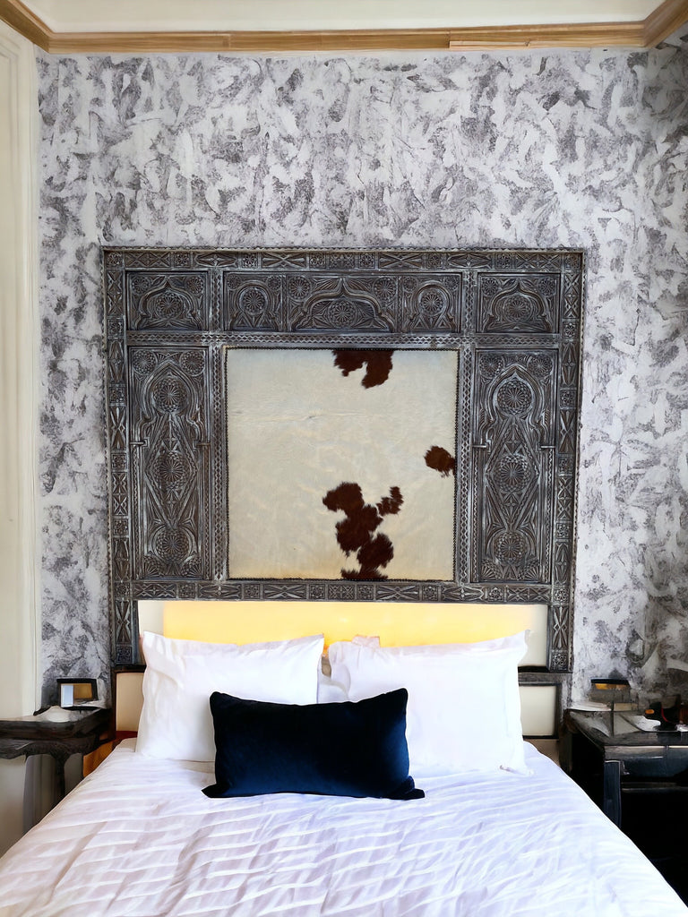 Moroccan cowhide carved headboard bed | A mix culture theme in this beautiful & unique piece of furniture