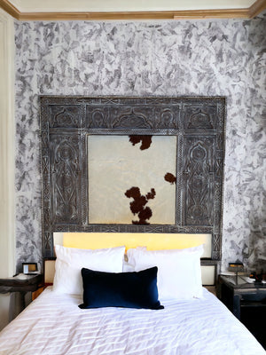 Moroccan cowhide carved headboard bed | A mix culture theme in this beautiful & unique piece of furniture