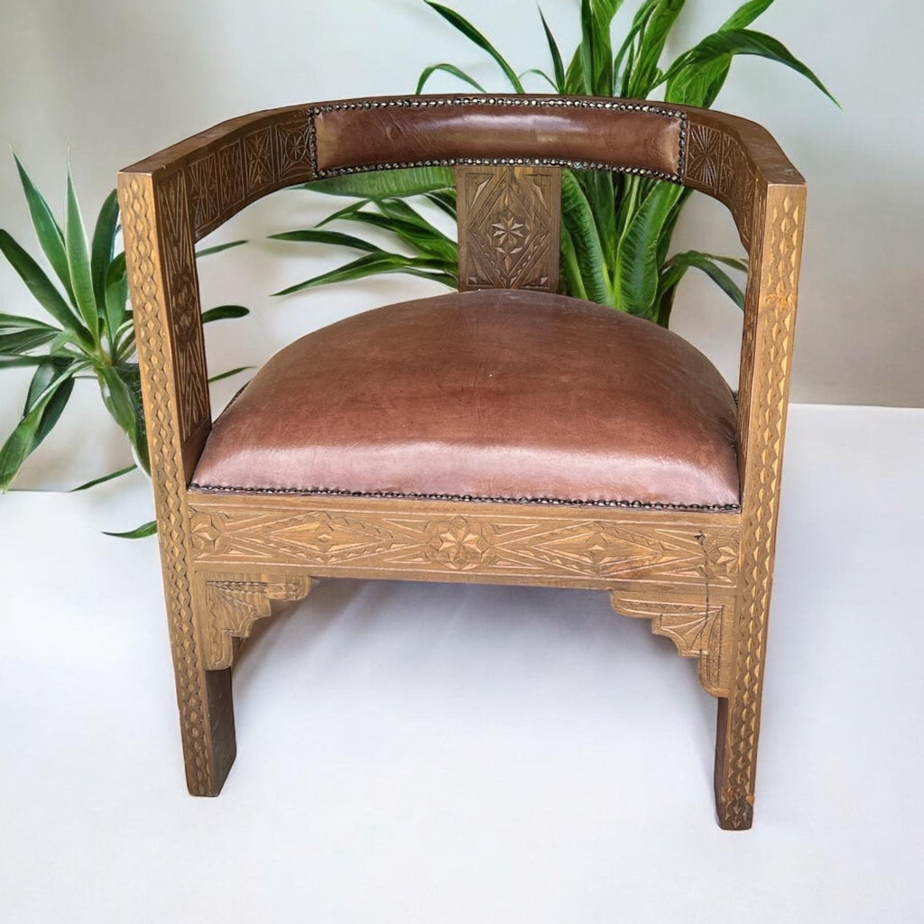 Two Horse shoe leather wooden chairs