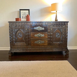 Andalusian carved wooden  cabinet with drawers and door panels with silver accent and brass knobs handmade in Morocco